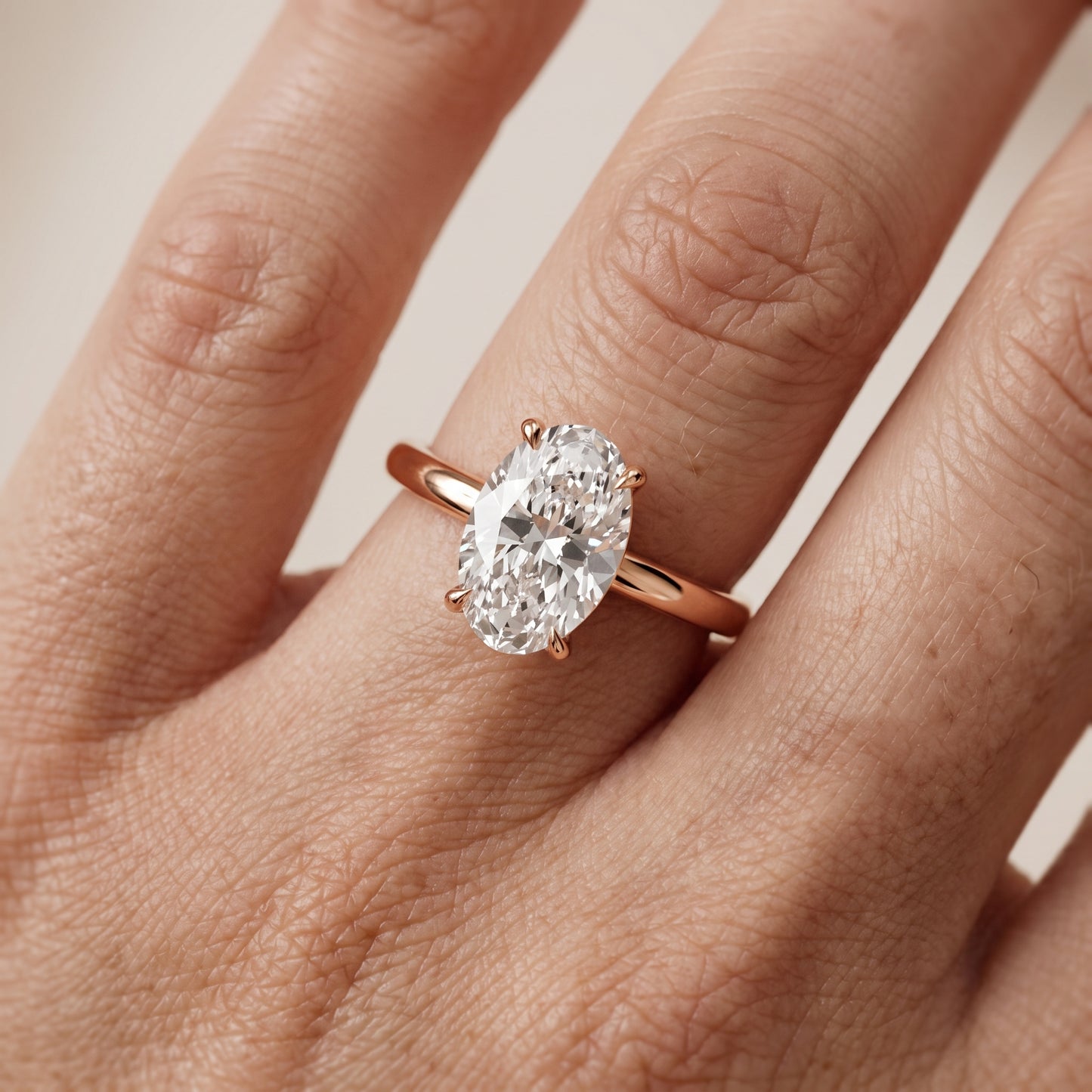 Lyla Petite Solitaire Oval Diamond Engagement Ring in Rose Gold - lifestyle.jpg