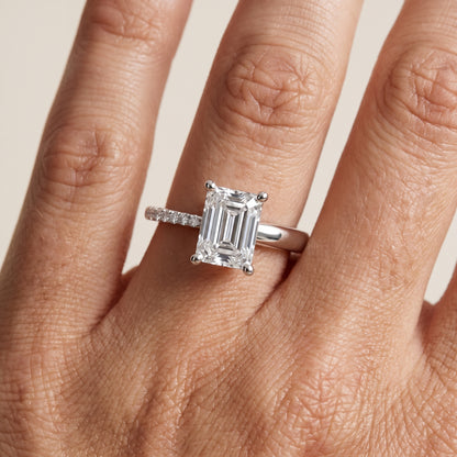 Rosie Solitaire Basket Emerald Diamond Engagement Ring in Platinum - lifestyle.jpg