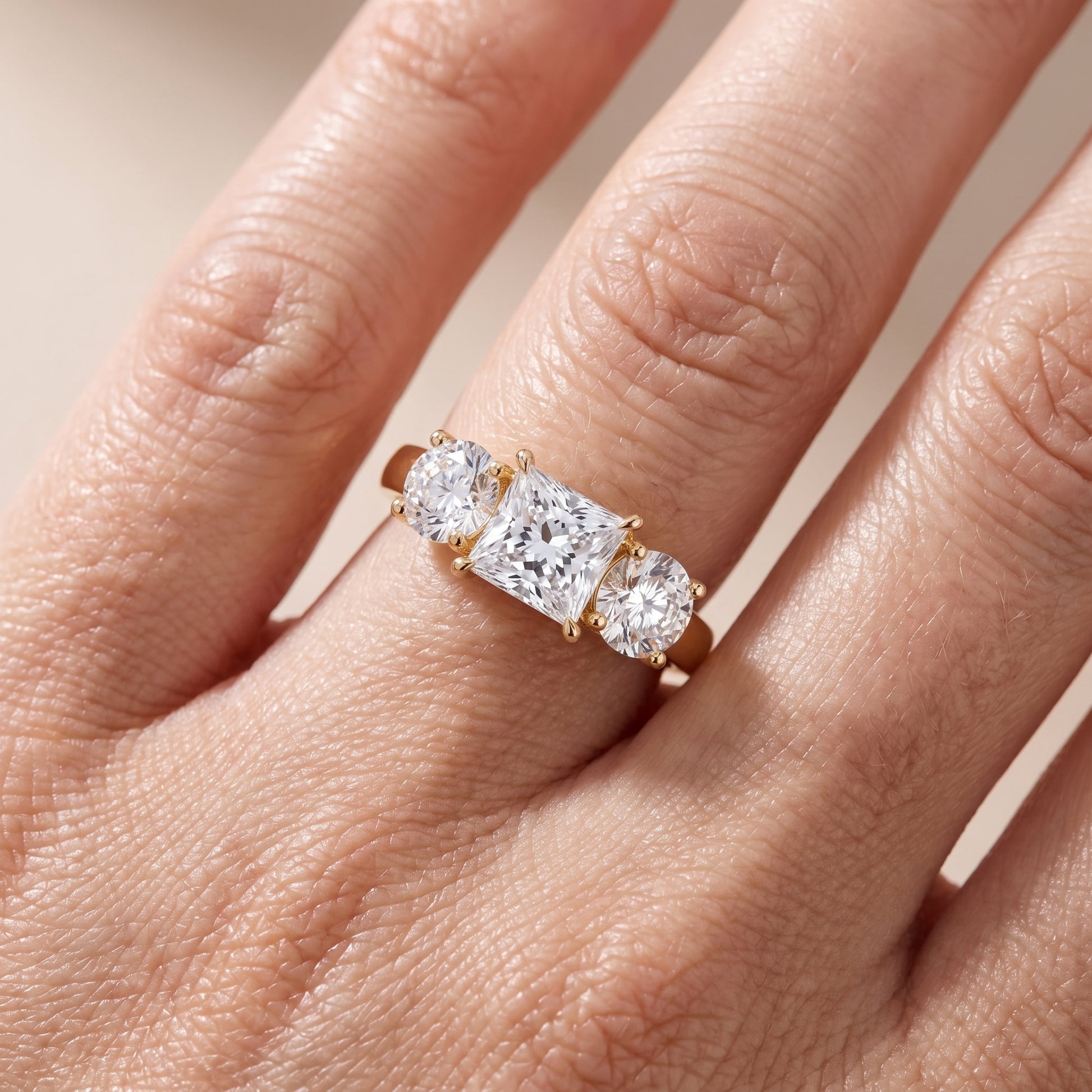 Esme Three-Stone Tapered Princess Diamond Ring in Yellow Gold - lifestyle.jpg