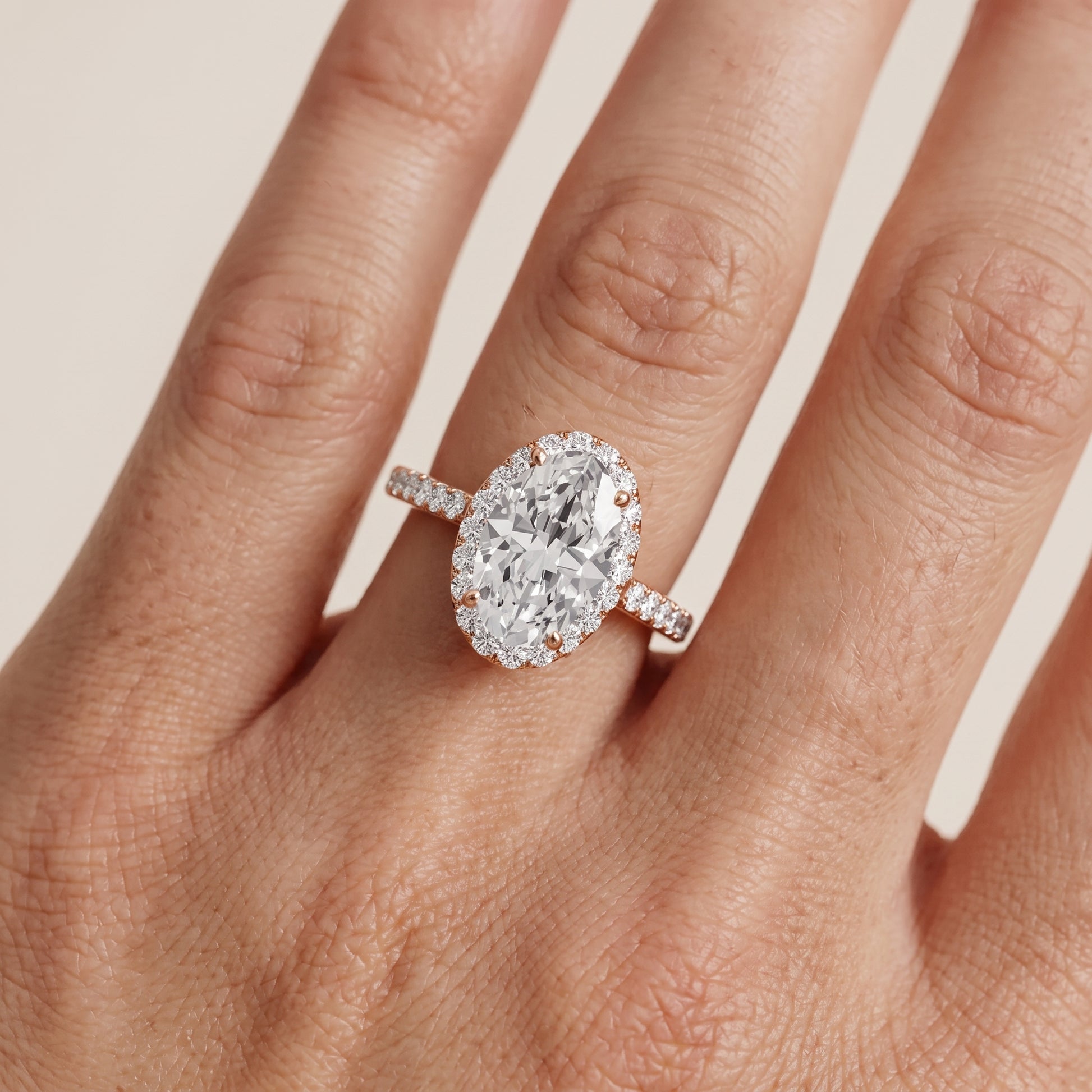 Alma Halo Pavé Oval Diamond Ring in Rose Gold - lifestyle.jpg