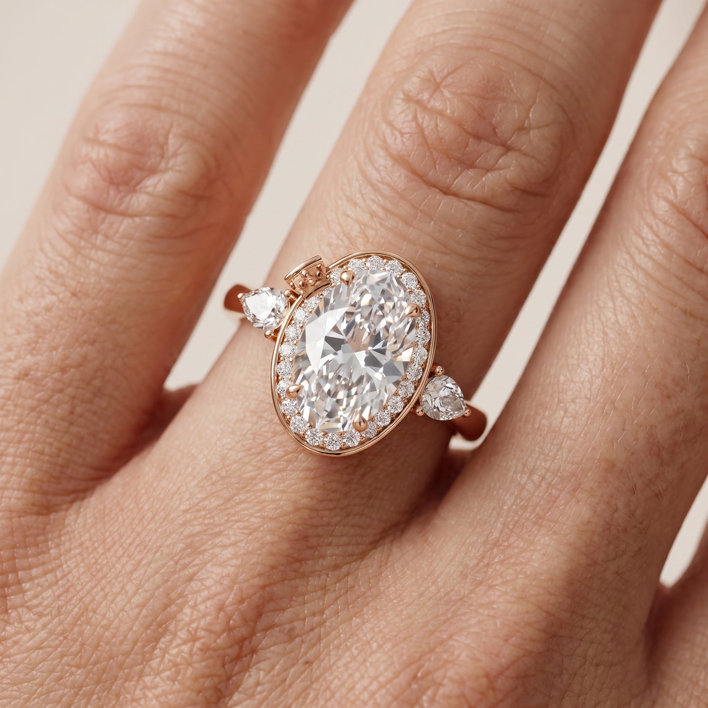 Eliza Halo Sidestone Oval Diamond Engagement Ring in Rose Gold - lifestyle.jpg