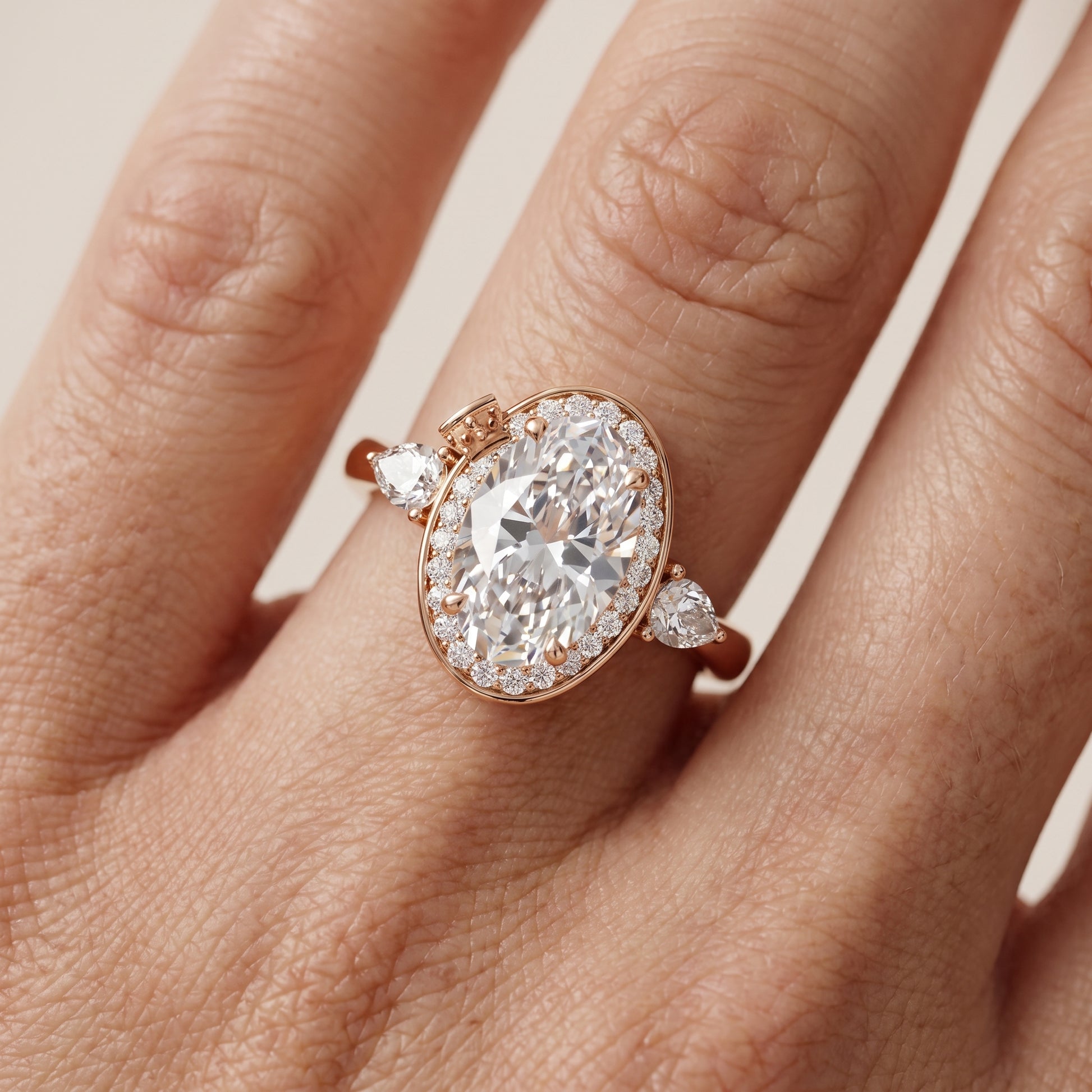 Eliza Halo Sidestone Oval Diamond Engagement Ring in Rose Gold - lifestyle.jpg