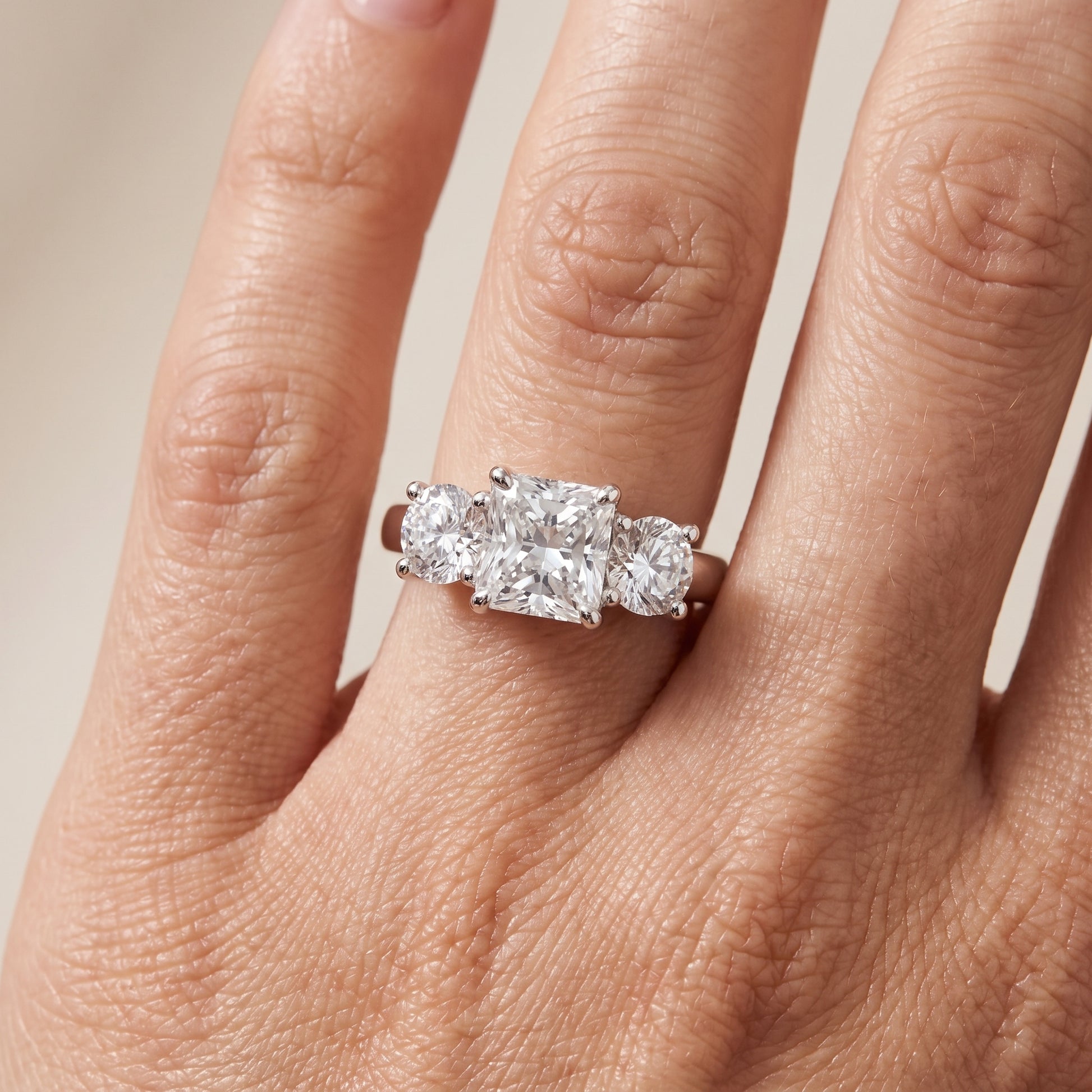 Callie Three-Stone Trellis Radiant Diamond Engagement Ring in Platinum - lifestyle.jpg