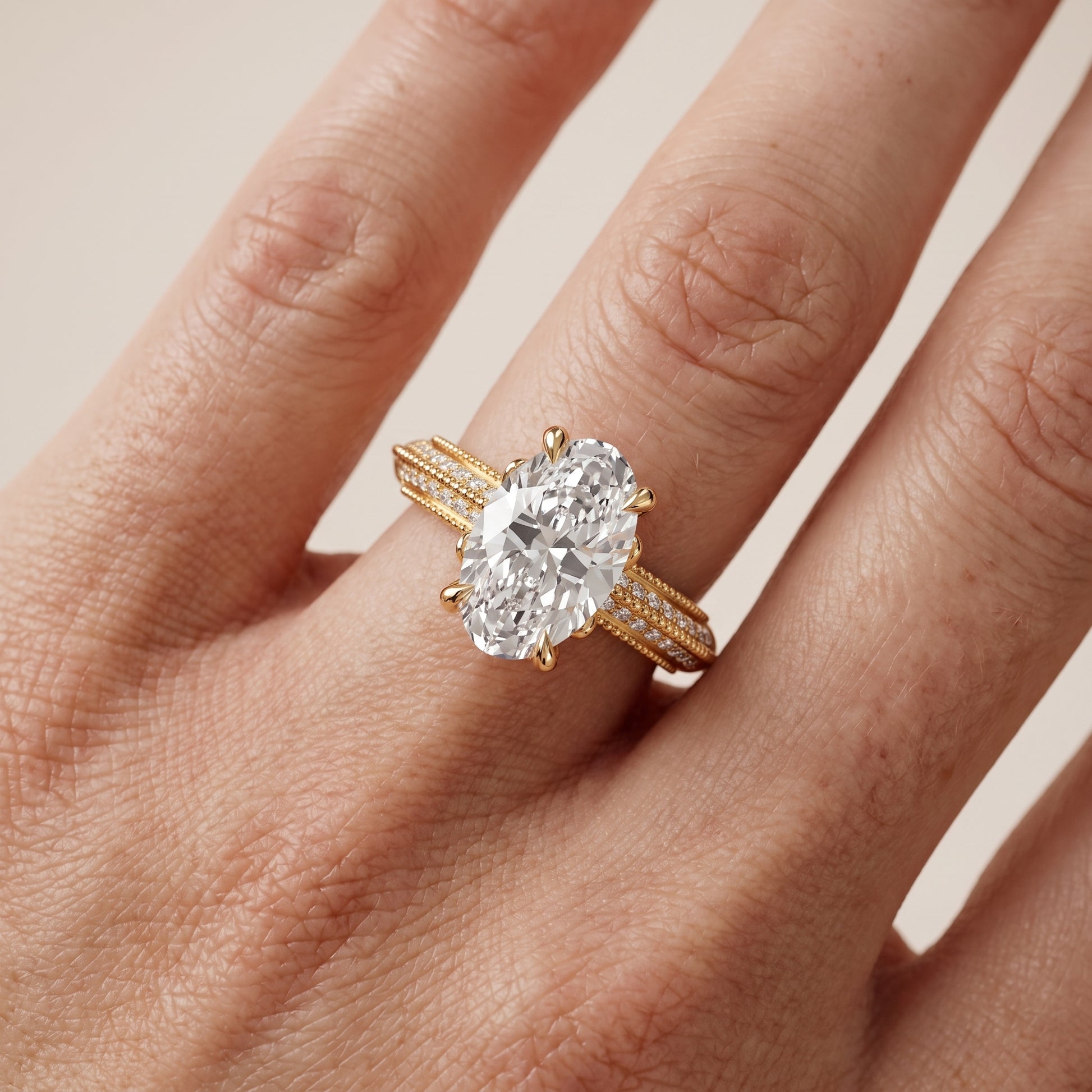 Indie Vintage Milgrain Oval Diamond Engagement Ring in Yellow Gold - lifestyle.jpg