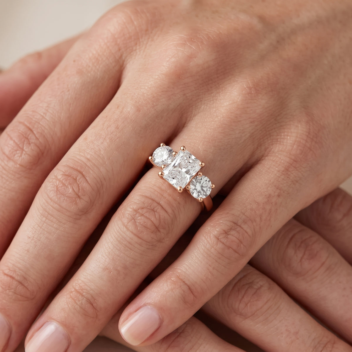 Callie Three-Stone Trellis Radiant Diamond Engagement Ring in Rose Gold - lifestyle.jpg