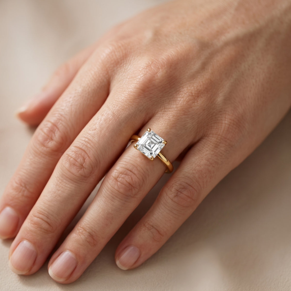 Charlotte Charm Solitaire Asscher Diamond Engagement Ring in Yellow Gold - lifestyle.jpg