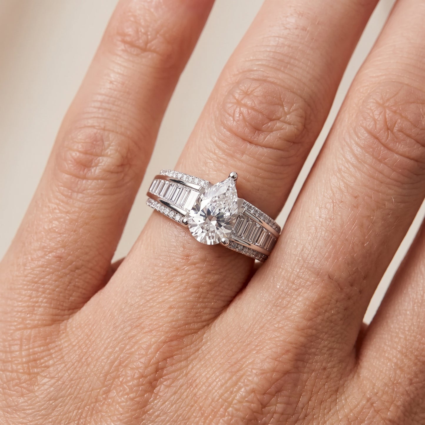 Halle Channel Set Baguette Accent Pear Diamond Engagement Ring in Platinum - lifestyle.jpg