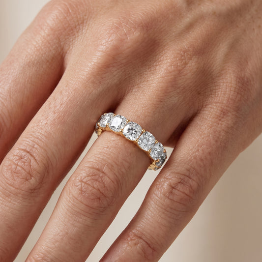 Vida Shared Prong Cushion Diamond Eternity Band in Yellow Gold - lifestyle.jpg