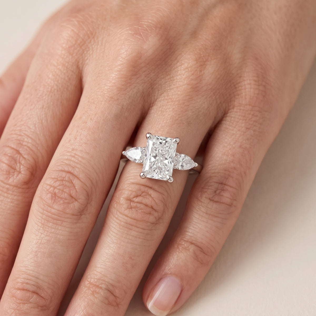 Faye Three-Stone Trellis Radiant Diamond Engagement Ring in Silver - lifestyle.jpg