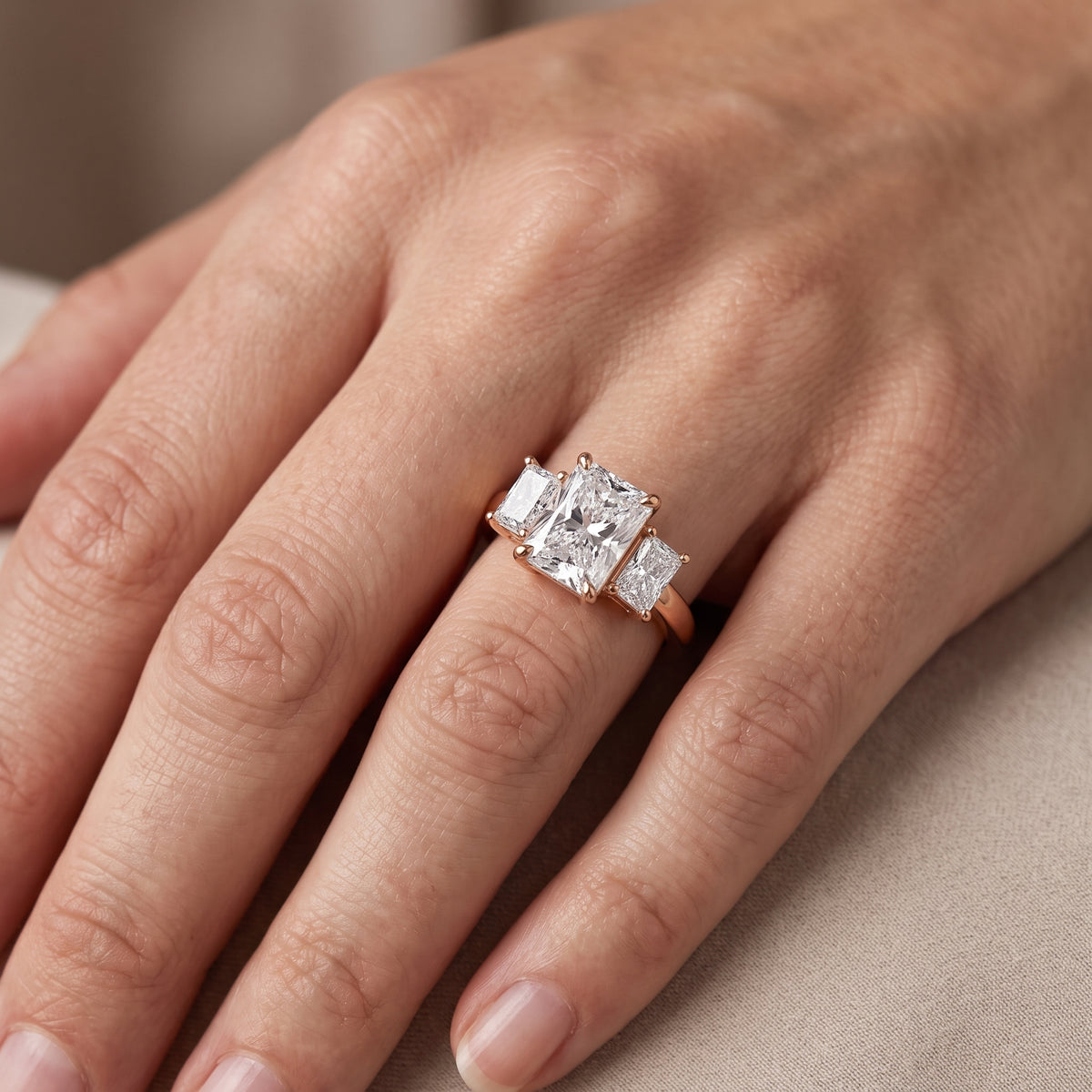 Zoe Three-Stone Radiant Diamond Engagement Ring in Rose Gold - lifestyle.jpg
