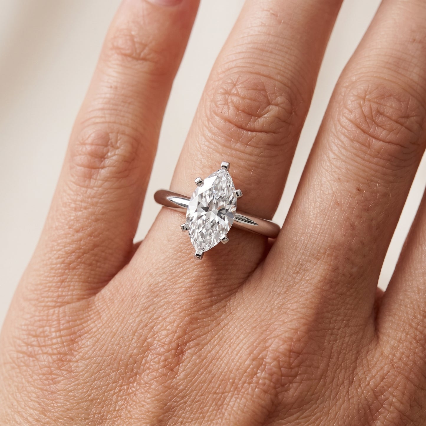 Amira Six-Prong Solitaire Marquise Diamond Engagement Ring in Silver - lifestyle.jpg