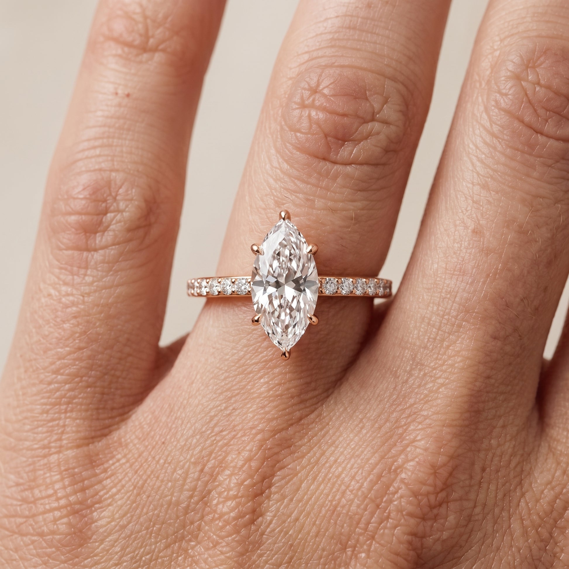 Aisha Pavé Solitaire Marquise Diamond Engagement Ring in Rose Gold - lifestyle.jpg