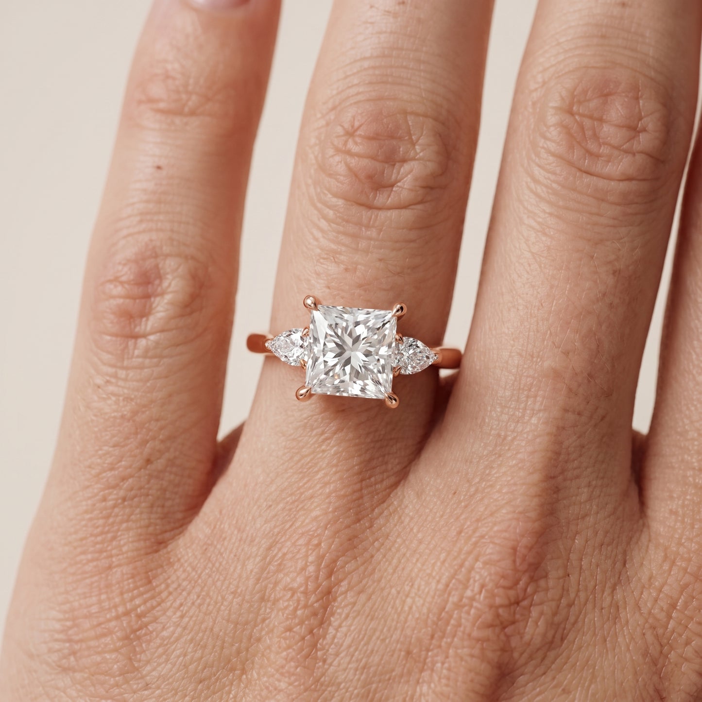 Leila Three-Stone Princess Diamond Engagement Ring in Rose Gold - lifestyle.jpg
