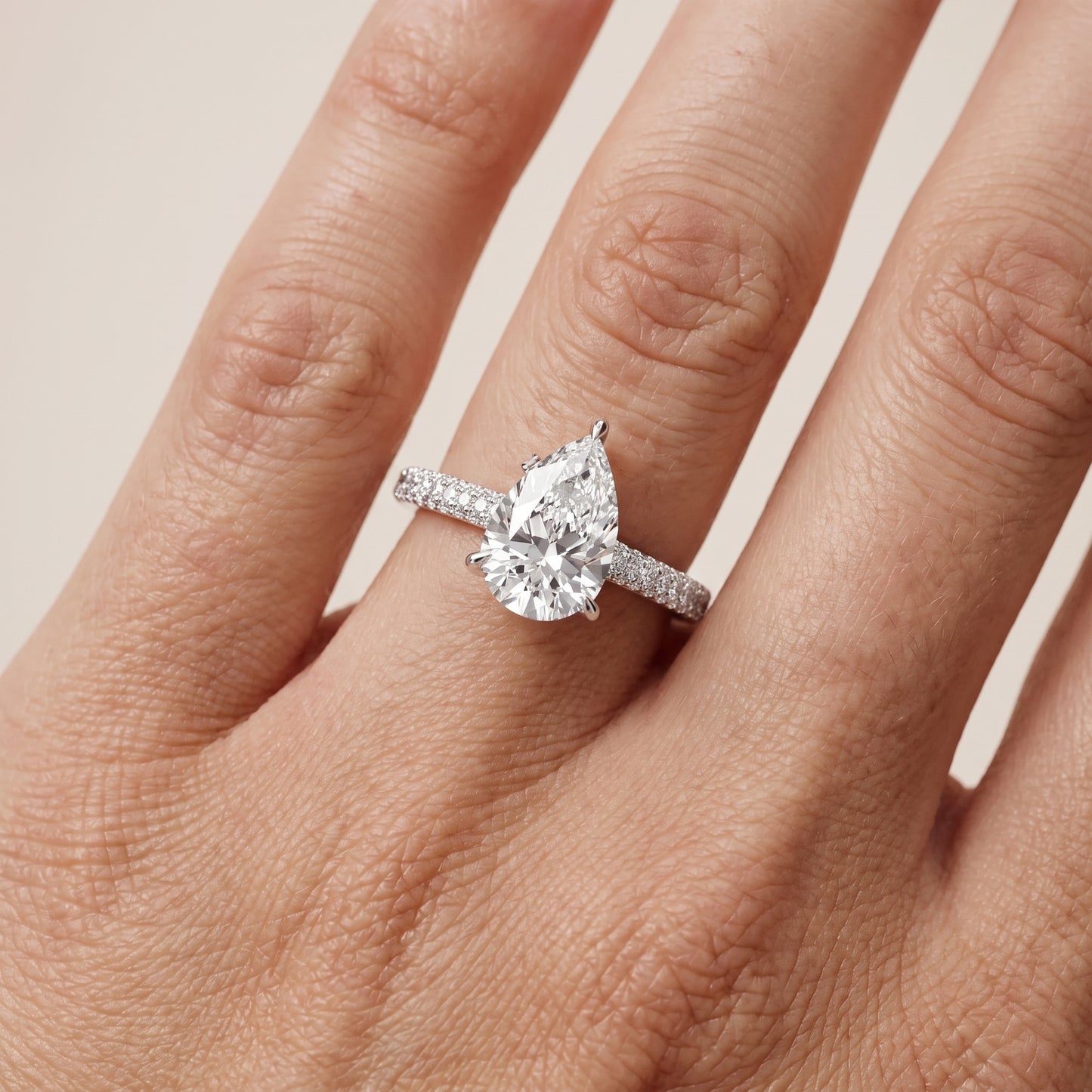 Della Hidden Halo Pavé Pear Diamond Engagement Ring in Silver - lifestyle.jpg