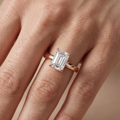 Lara Hidden Halo Emerald Diamond Engagement Ring in Rose Gold - lifestyle.jpg