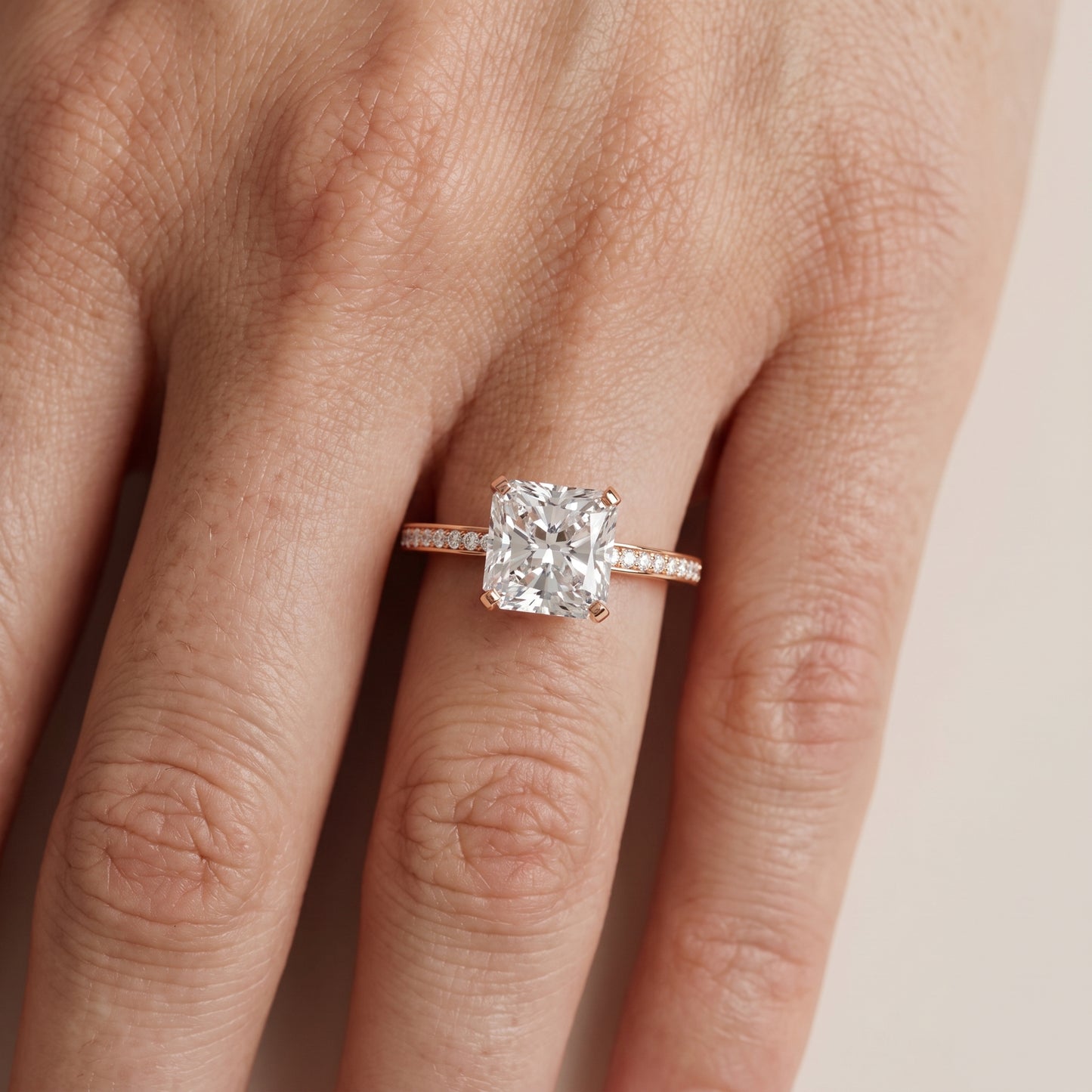Naia Hidden Halo Radiant Diamond Ring in Rose Gold - lifestyle.jpg
