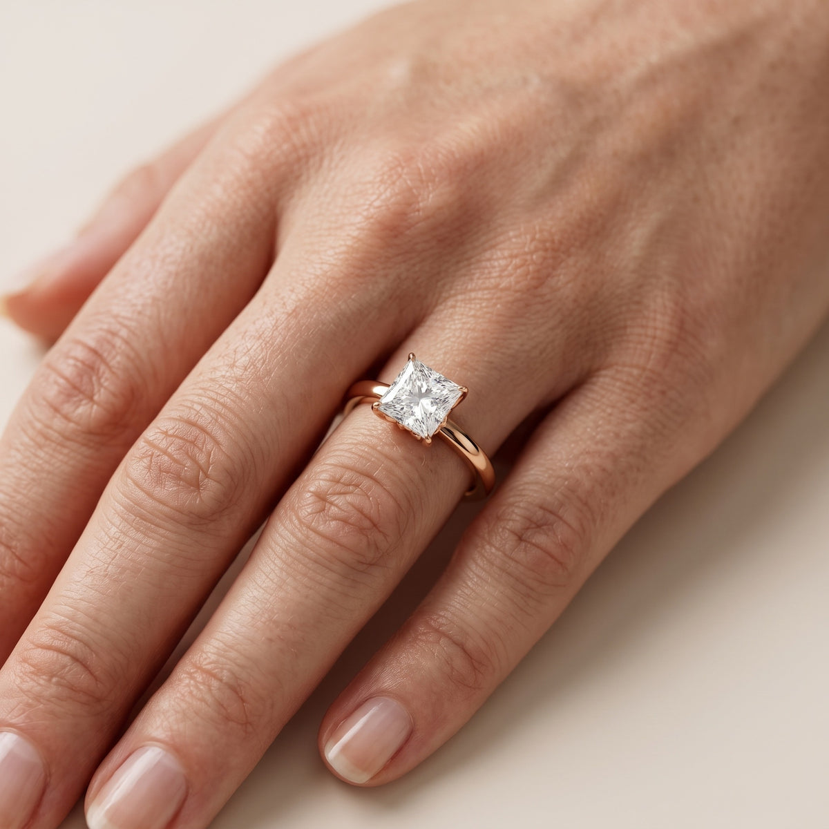 Serena Blossom Solitaire Princess Diamond Engagement Ring in Rose Gold - lifestyle.jpg