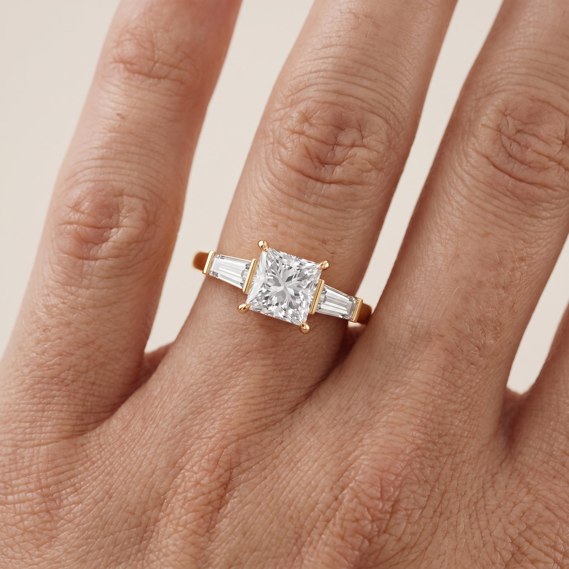 Zelda Tapered Baguette Princess Diamond Engagement Ring in Yellow Gold - lifestyle.jpg