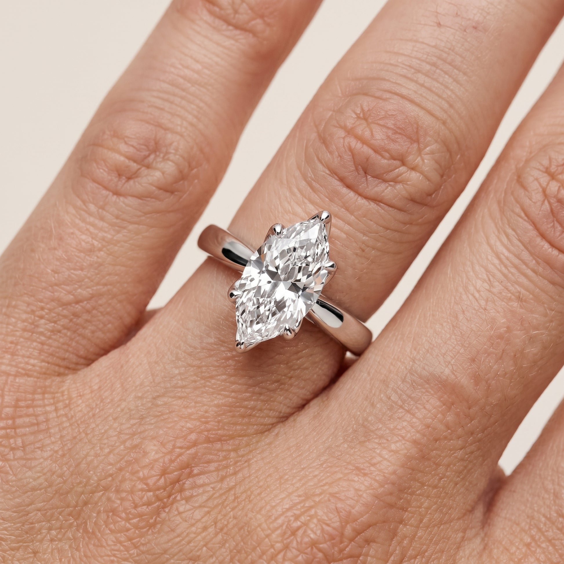 Lucia Solitaire Six-Prong Marquise Diamond Engagement Ring in Silver - lifestyle.jpg