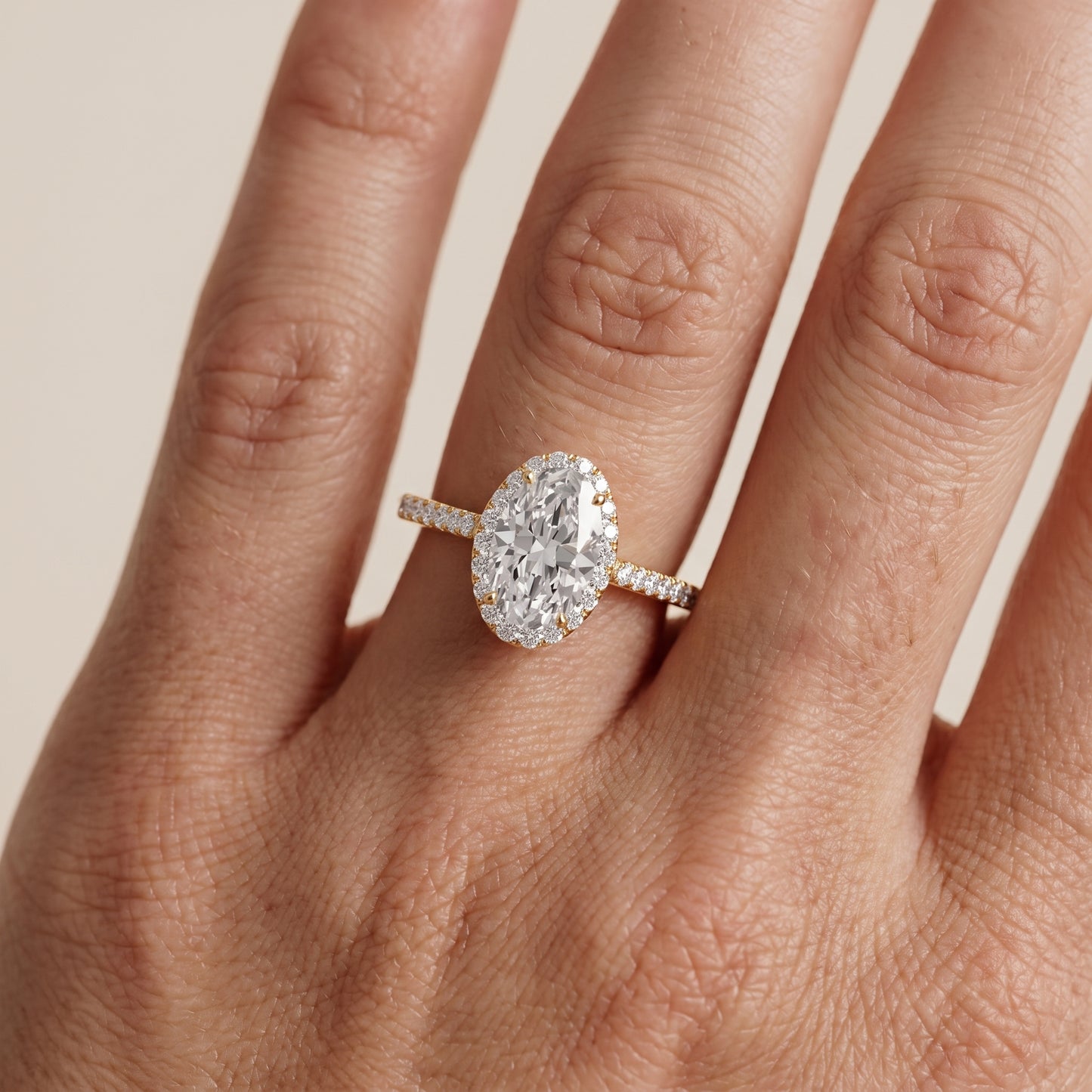 Willa Halo Micropavé Oval Diamond Engagement Ring in Yellow Gold - lifestyle.jpg