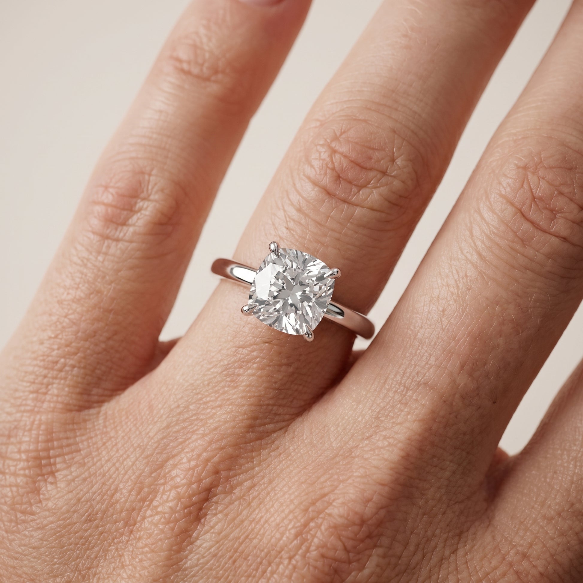 Lyla Petite Solitaire Cushion Diamond Engagement Ring in Platinum - lifestyle.jpg