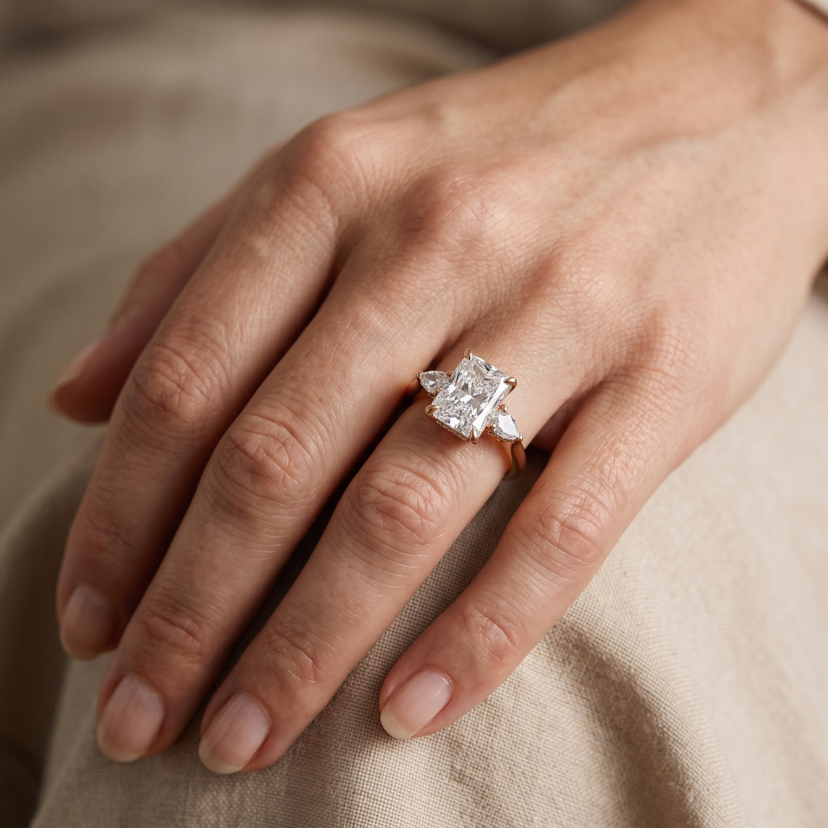 Leila Three-Stone Radiant Diamond Engagement Ring in Rose Gold - lifestyle.jpg