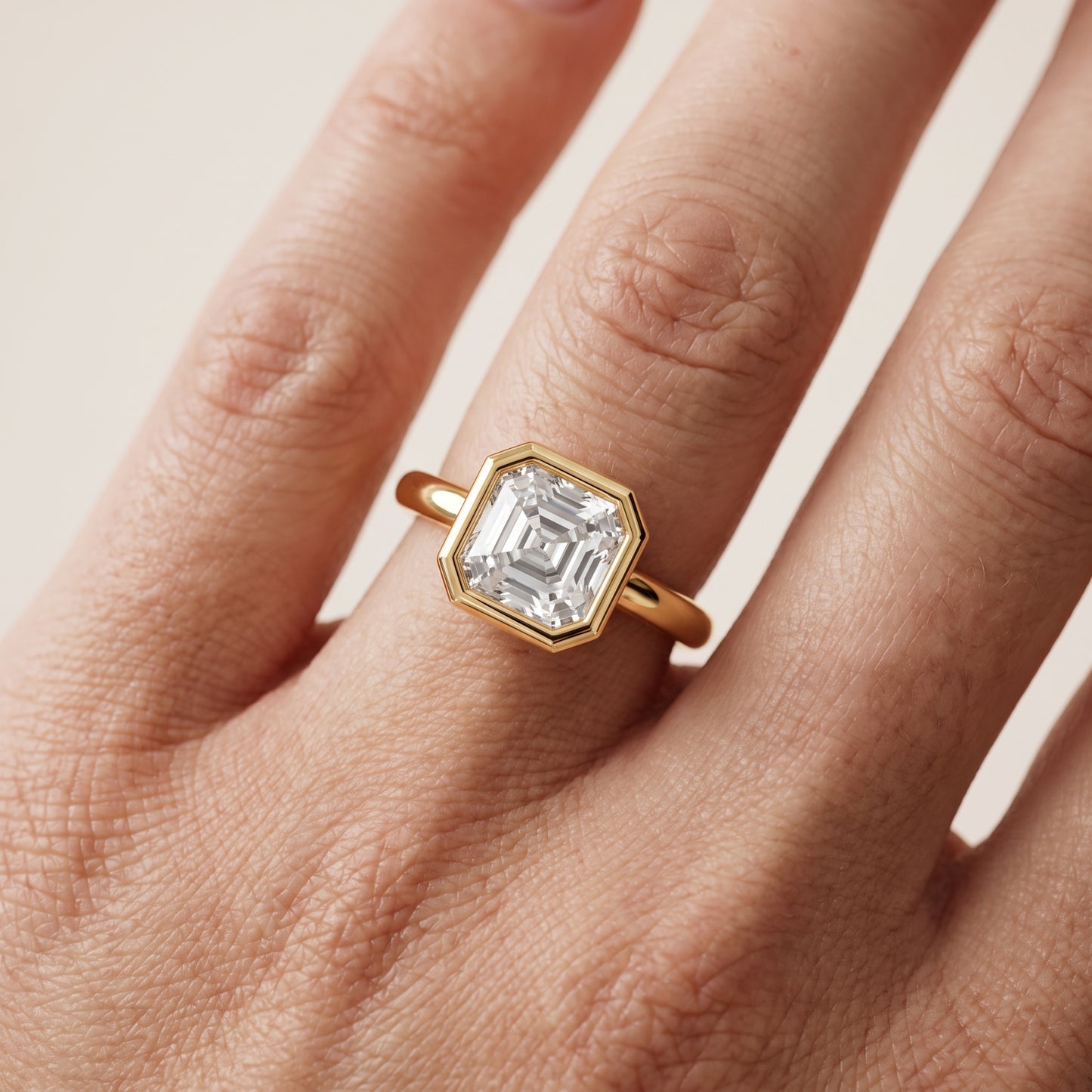 Maeve Bezel Solitaire Asscher Diamond Ring in Yellow Gold - lifestyle.jpg