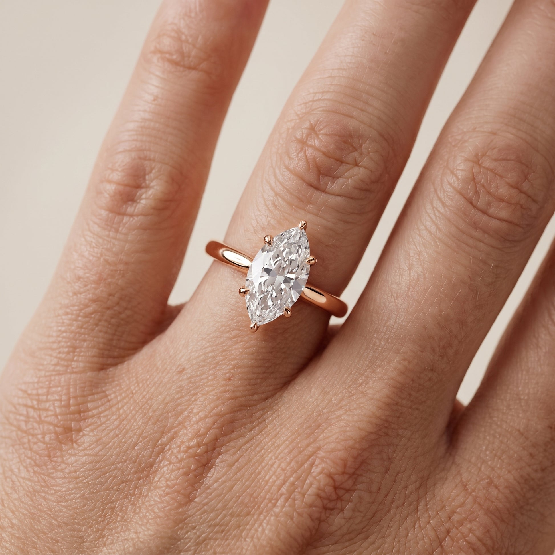 Mena Hidden Halo Marquise Diamond Engagement Ring in Rose Gold - lifestyle.jpg
