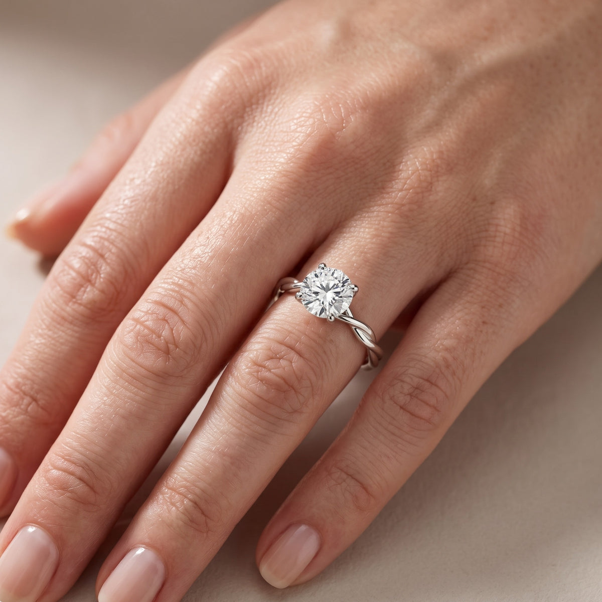 Iris Twist Round Diamond Engagement Ring in Platinum - lifestyle.jpg
