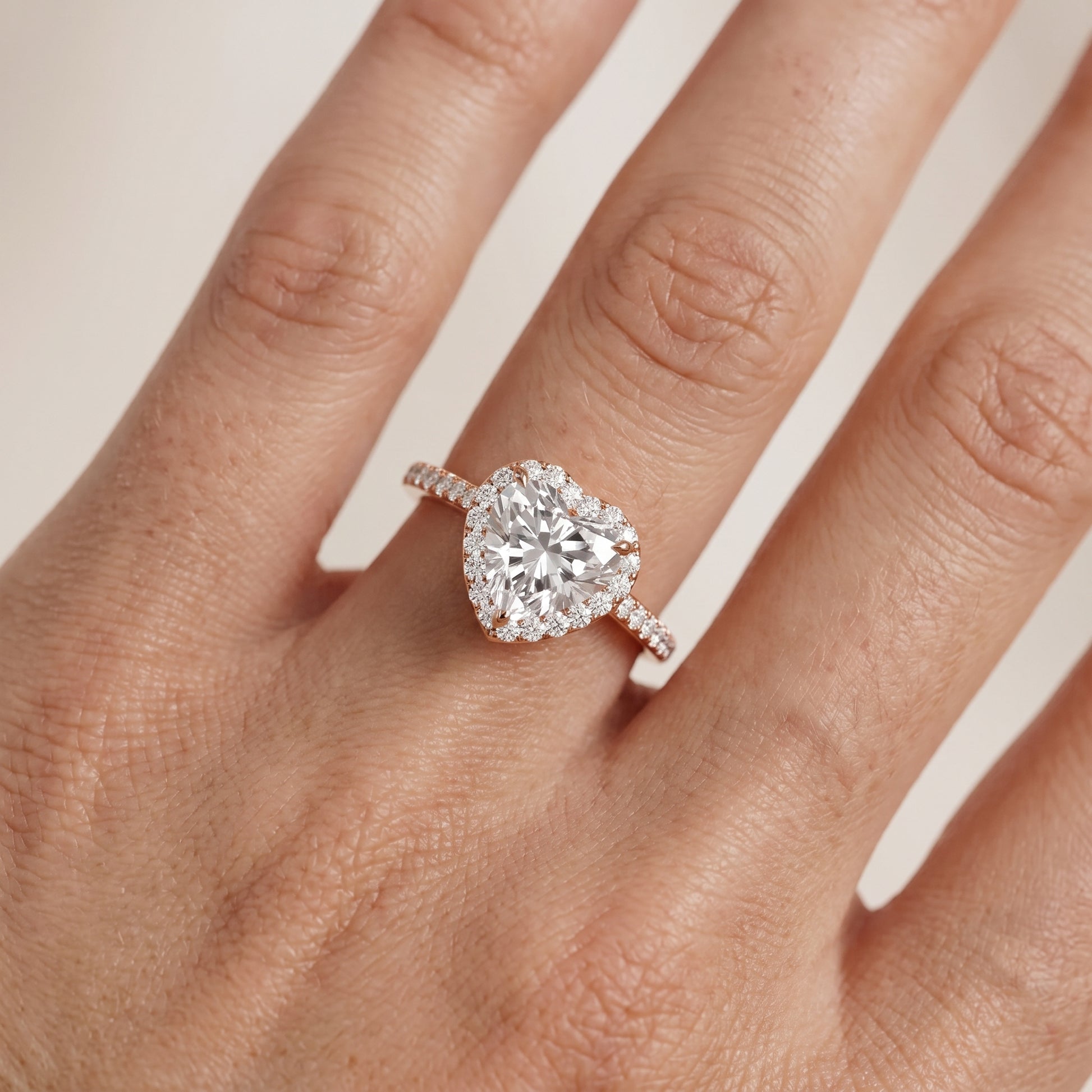 Alma Halo Pavé Heart Diamond Ring in Rose Gold - lifestyle.jpg