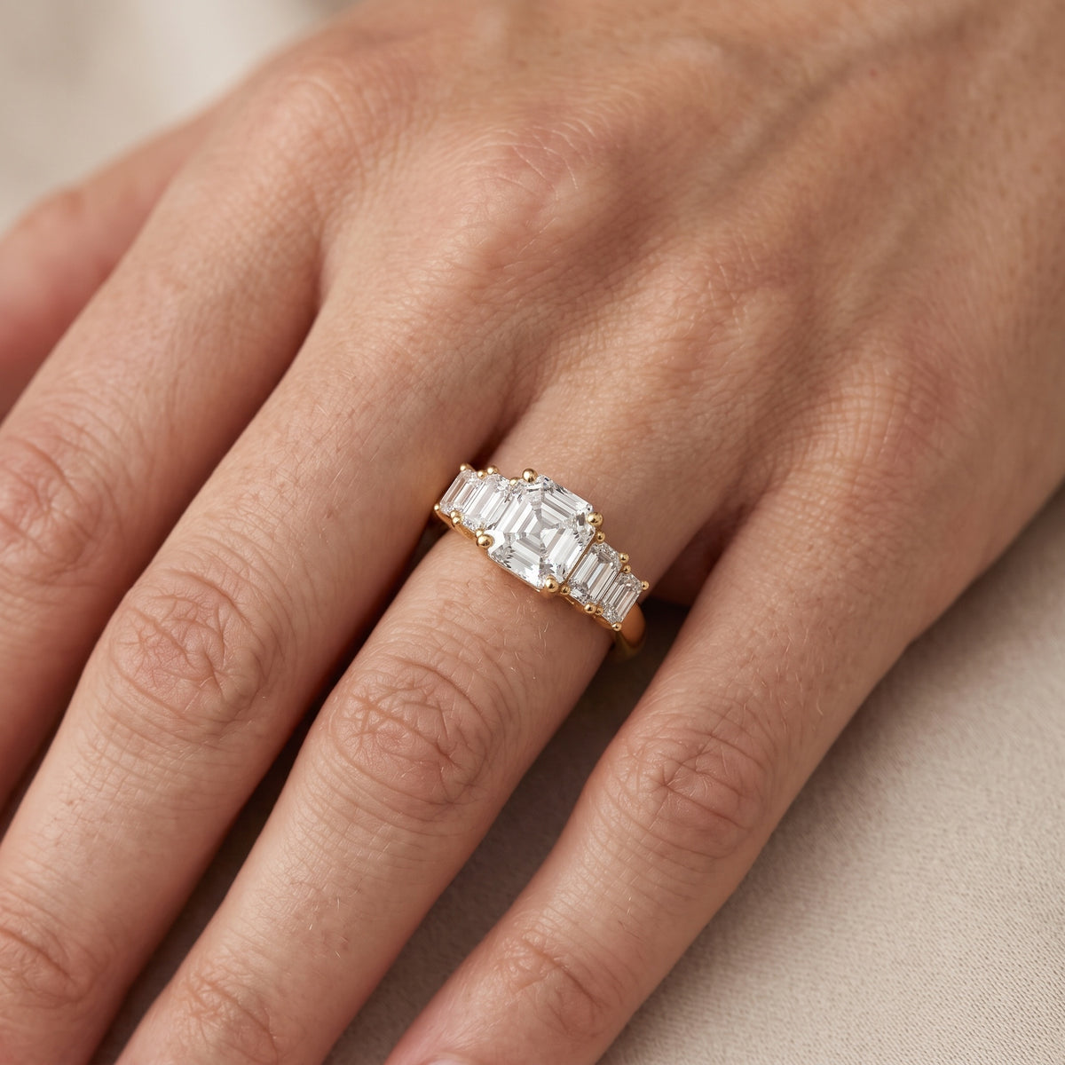 Damaris Baguette Five-Stone Asscher Diamond Engagement Ring in Platinum - lifestyle.jpg