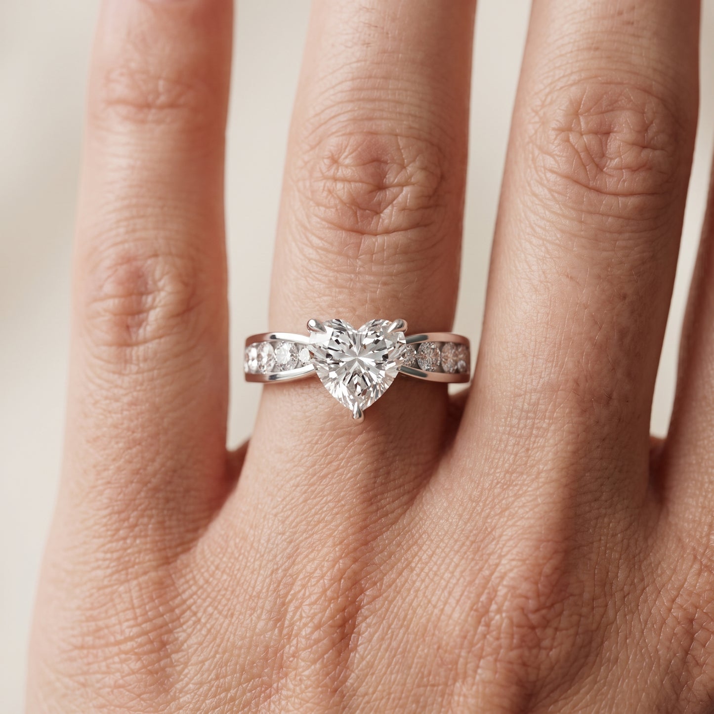 Noor Channel Set Sidestone Heart Diamond Engagement Ring in Silver - lifestyle.jpg