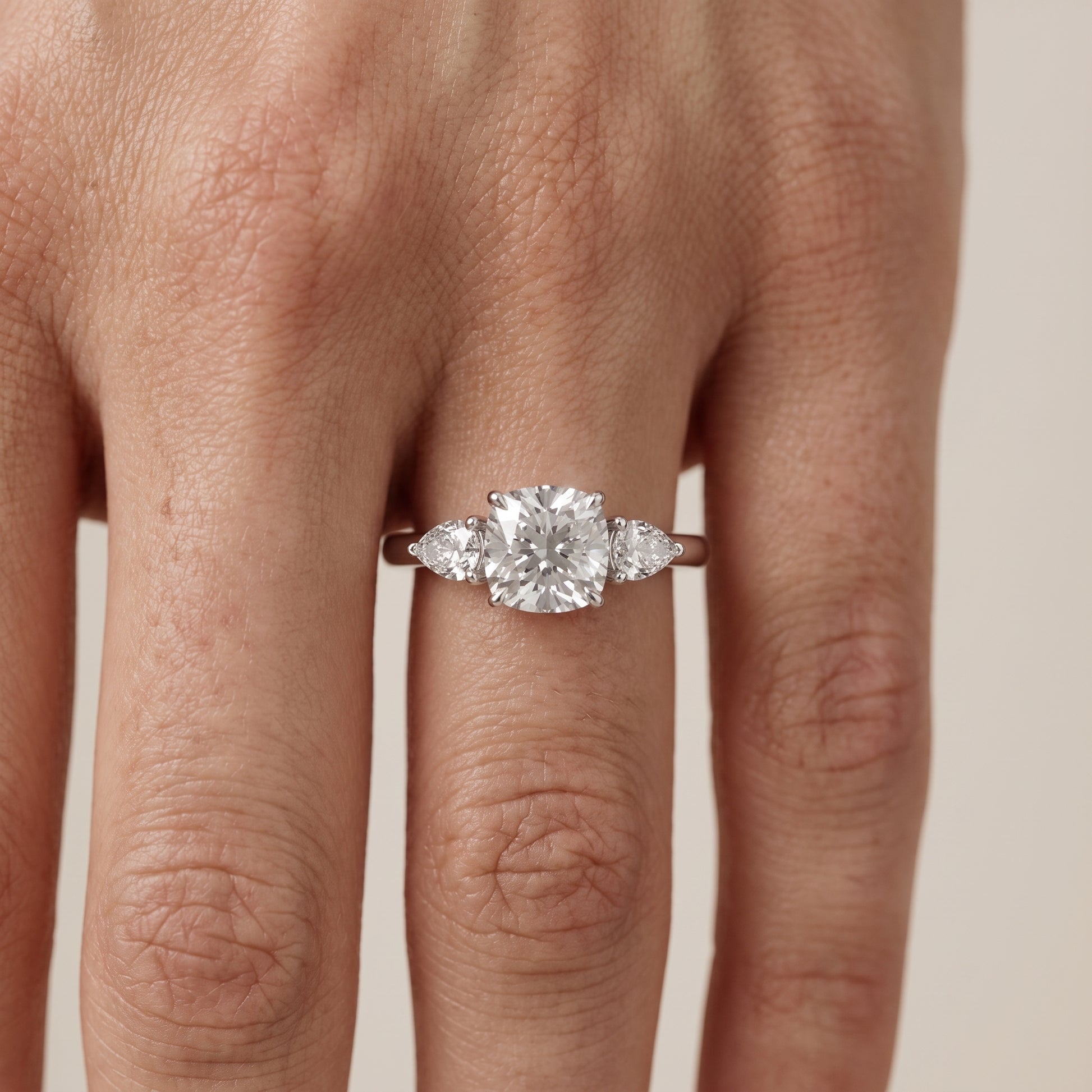 Phoebe Three-Stone Cushion Diamond Ring in Platinum - lifestyle.jpg