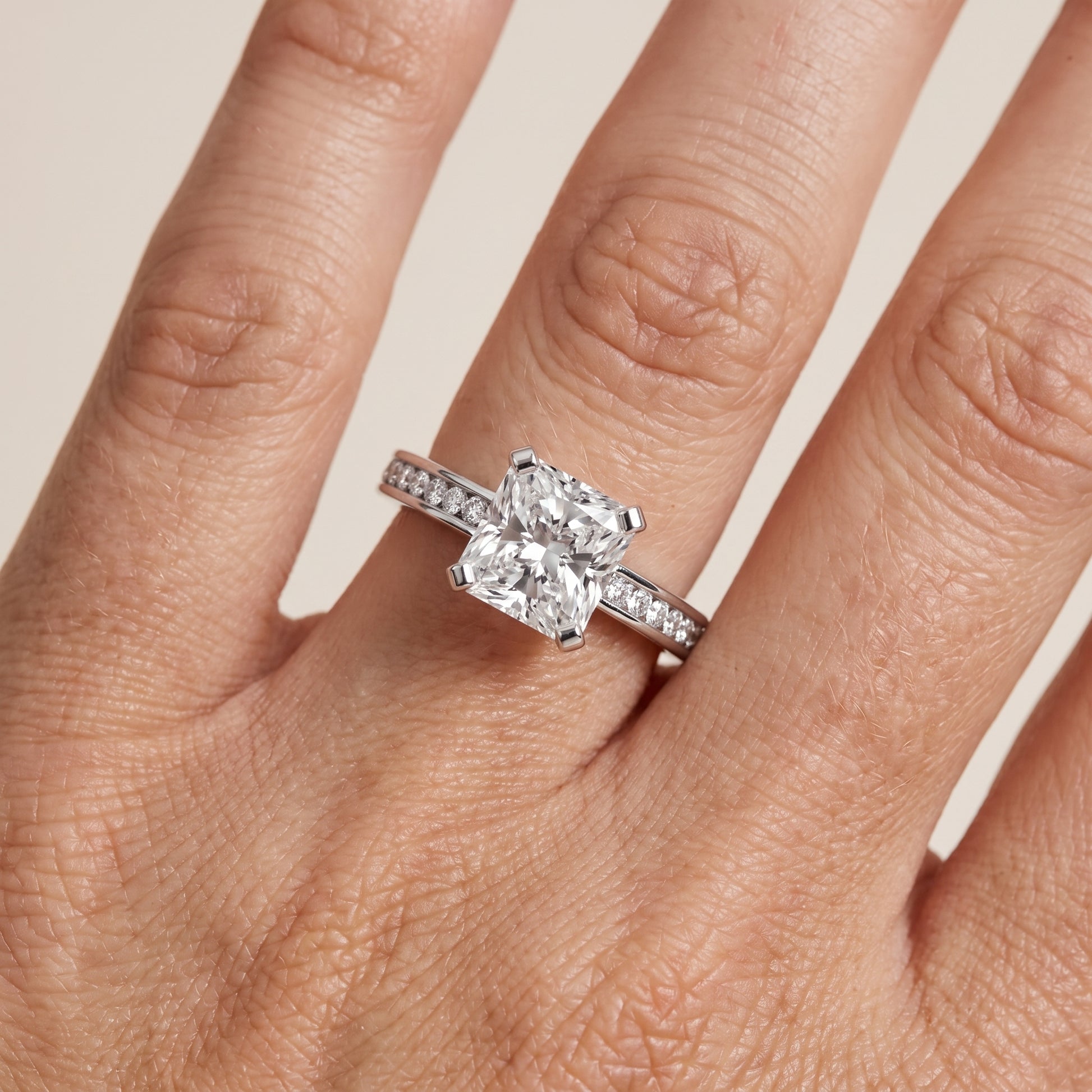 Tessa Solitaire Channel Set Radiant Diamond Engagement Ring in Silver - lifestyle.jpg