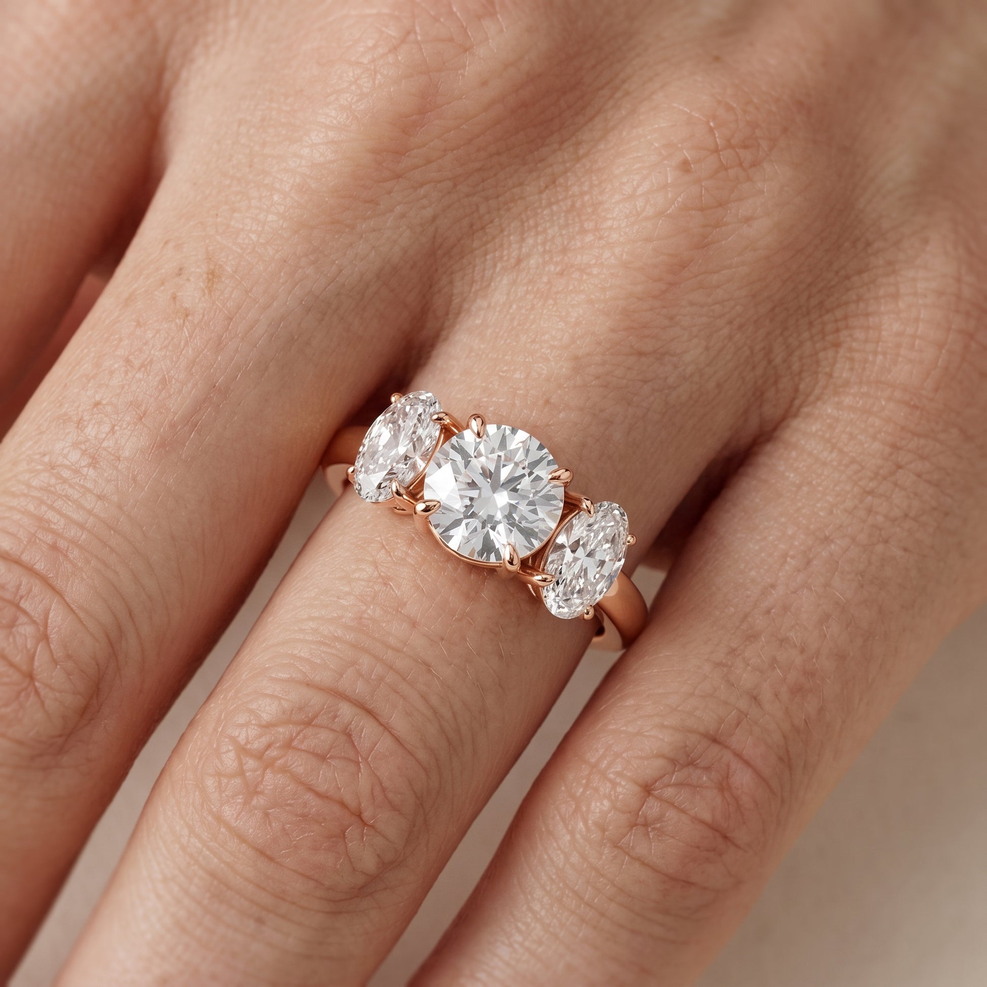 Lila Three-Stone Round Diamond Ring in Rose Gold - lifestyle.jpg