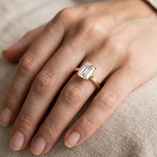 Matilda Cathedral Solitaire Emerald Diamond Engagement Ring in Yellow Gold - lifestyle.jpg