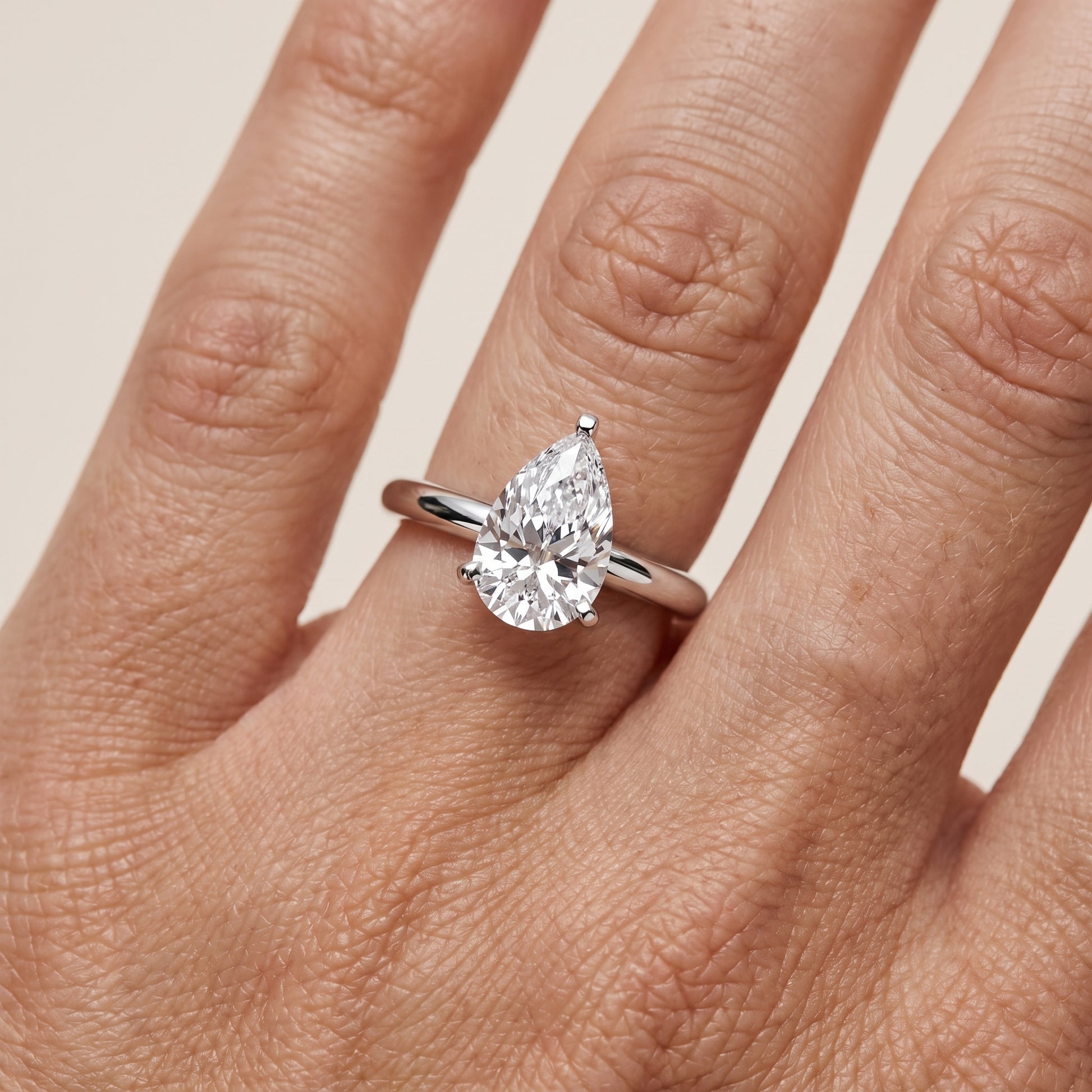 Wren Solitaire Pear Diamond Ring in Silver - lifestyle.jpg