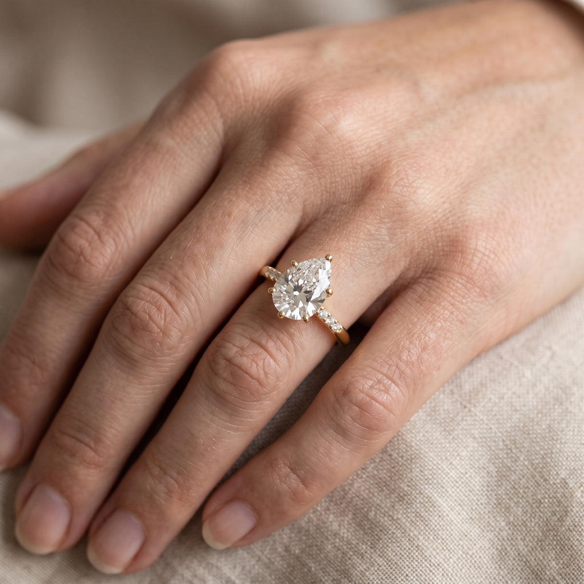 Aveline Flush-Set Pear Diamond Engagement Ring in Rose Gold - lifestyle.jpg