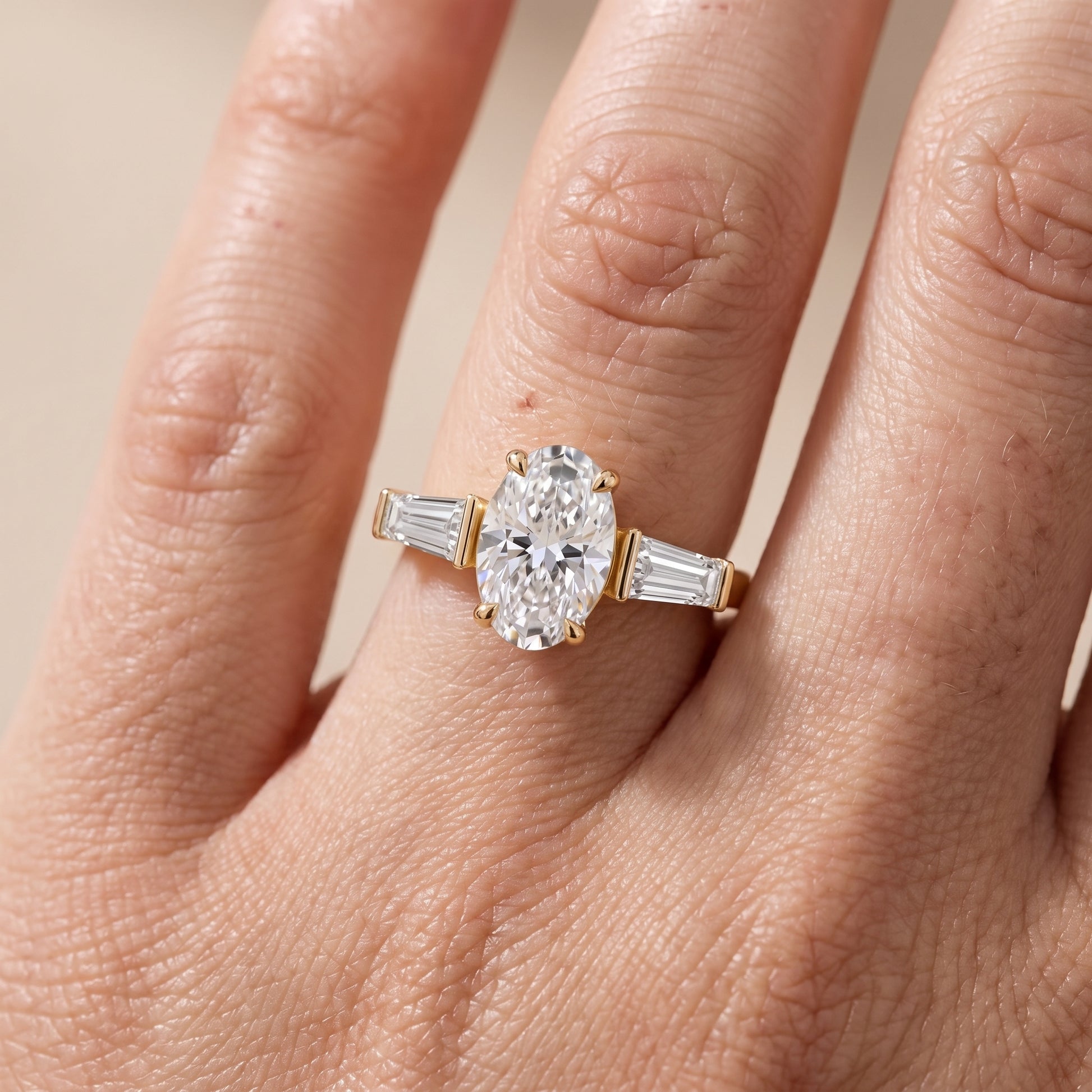 Layla Tapered Baguette Oval Diamond Ring in Yellow Gold - lifestyle.jpg