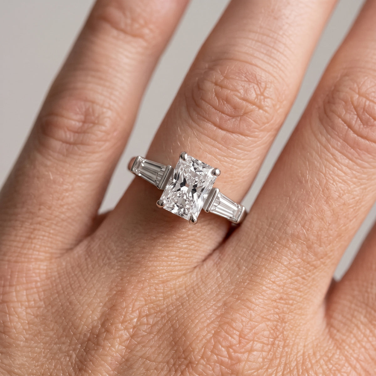 Layla Tapered Baguette Radiant Diamond Engagement Ring in Platinum - lifestyle.jpg
