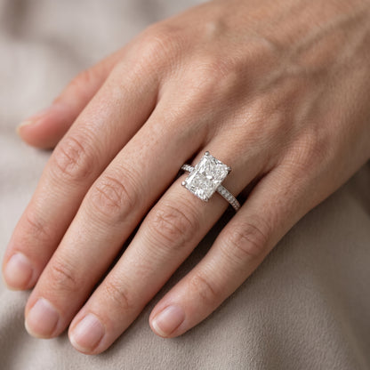 Naia Hidden Halo Radiant Diamond Engagement Ring in White Gold - lifestyle.jpg