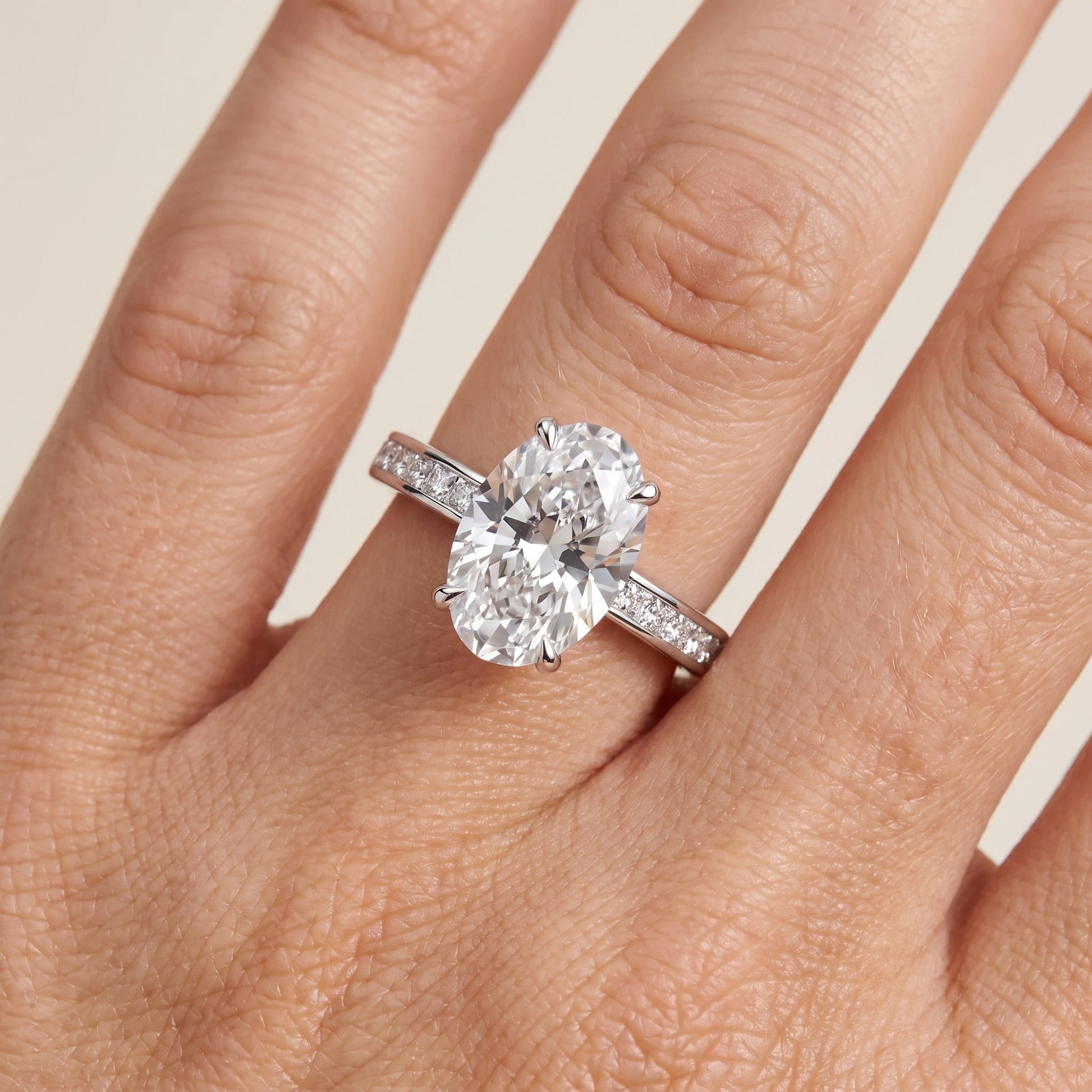 Maren Sidestone Channel Set Oval Diamond Engagement Ring in Silver - lifestyle.jpg