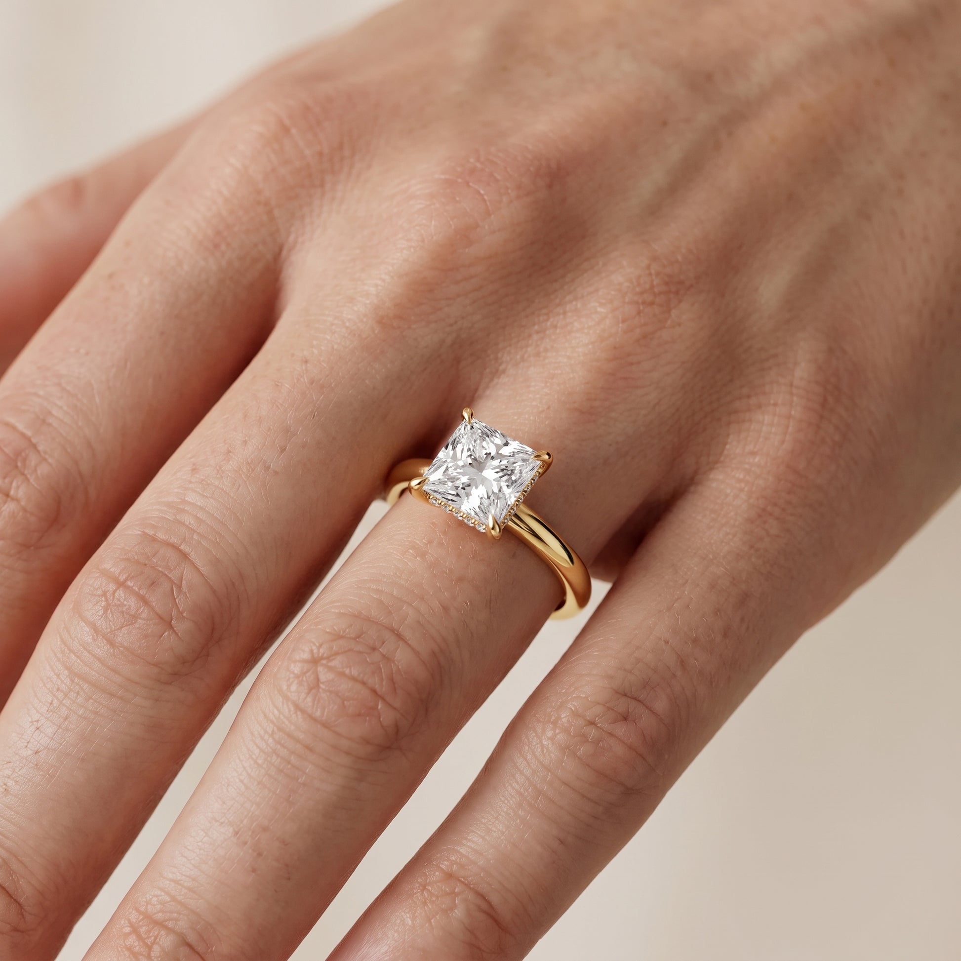 Amaya Hidden Halo Princess Diamond Ring in Yellow Gold - lifestyle.jpg