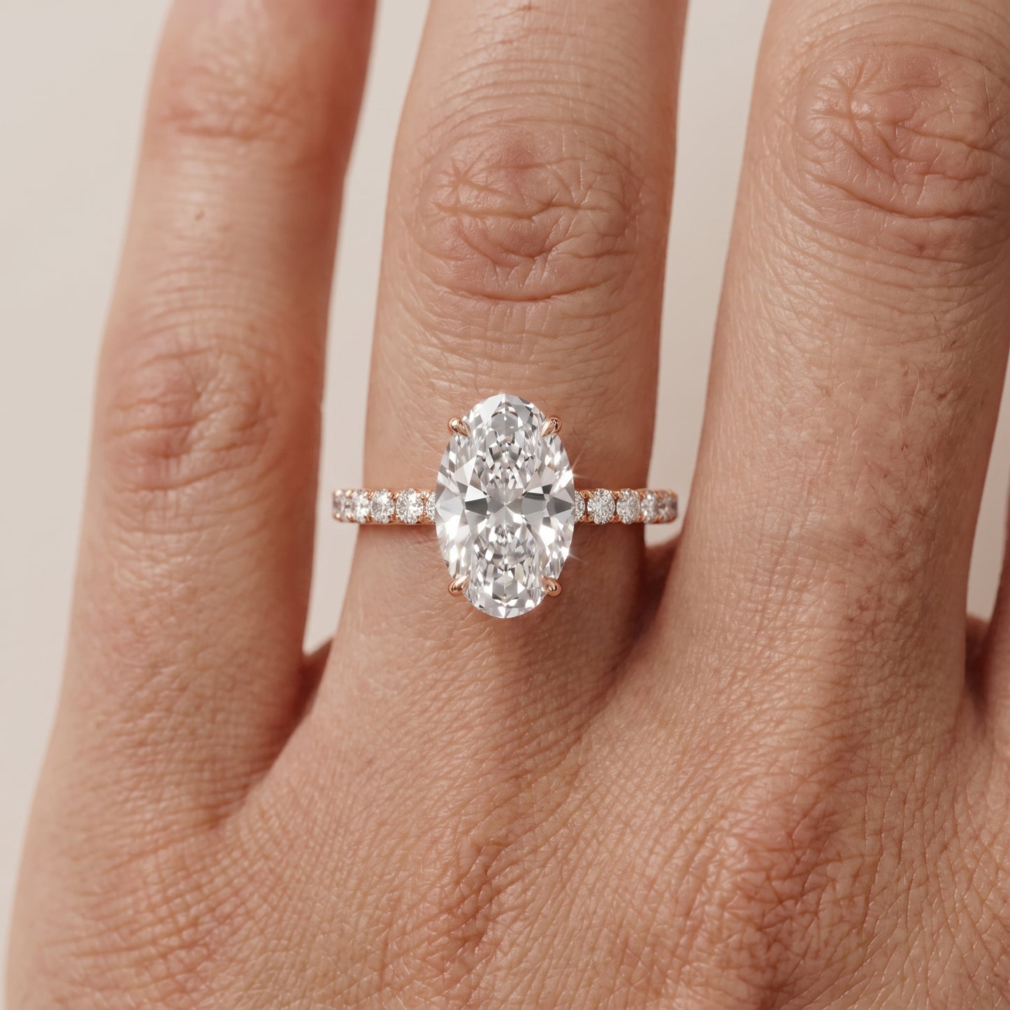 Juna French Pavé Solitaire Oval Diamond Engagement Ring in Rose Gold - lifestyle.jpg