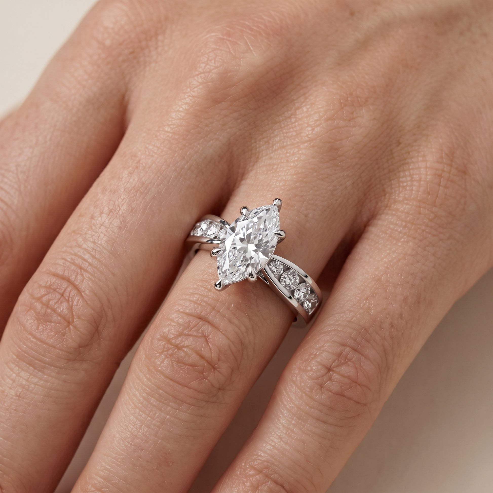 Noor Channel Set Sidestone Marquise Diamond Engagement Ring in White Gold - lifestyle.jpg