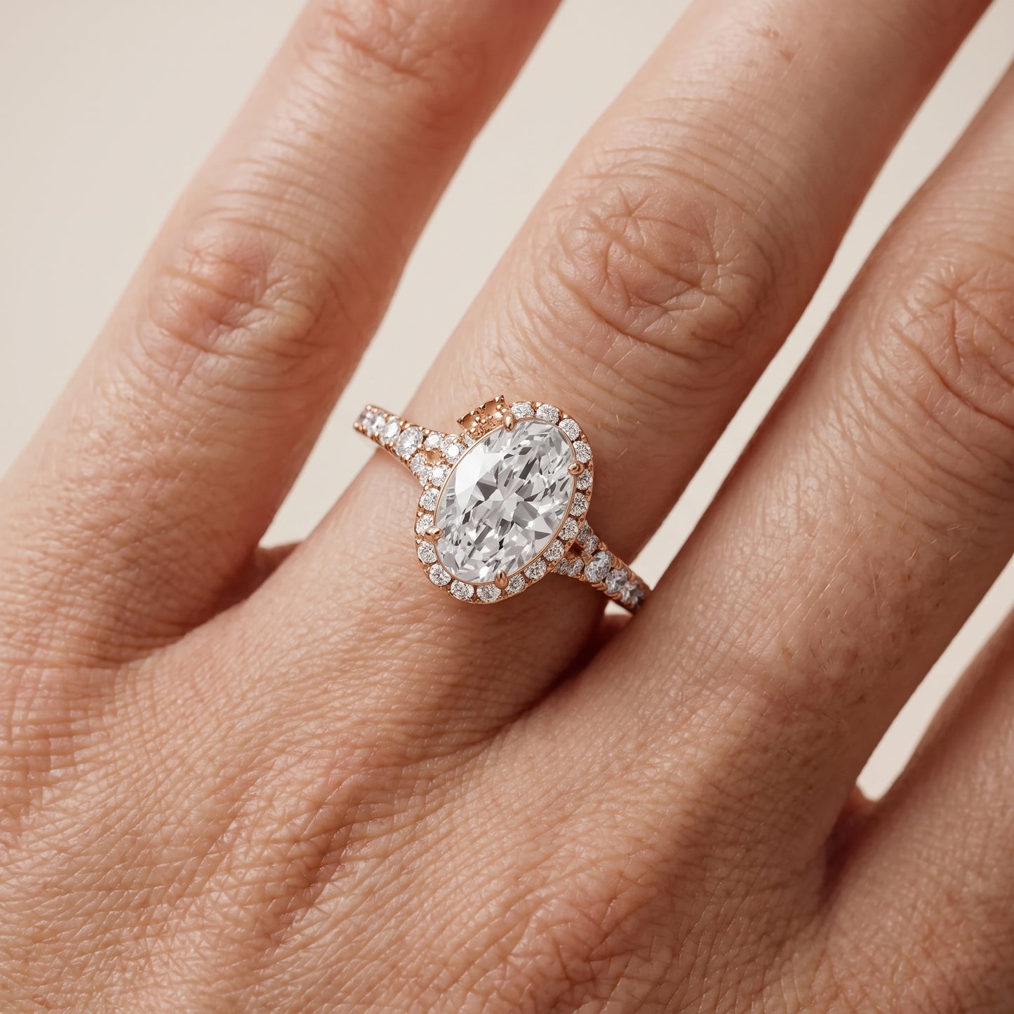 Bella Halo Pavé Oval Diamond Engagement Ring in Rose Gold - lifestyle.jpg