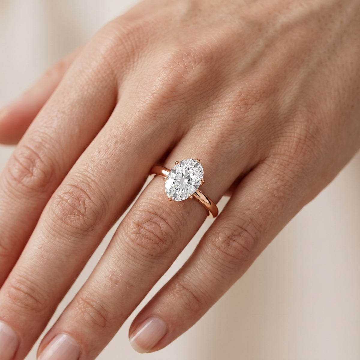 Serena Blossom Solitaire Oval Diamond Engagement Ring in Rose Gold - lifestyle.jpg