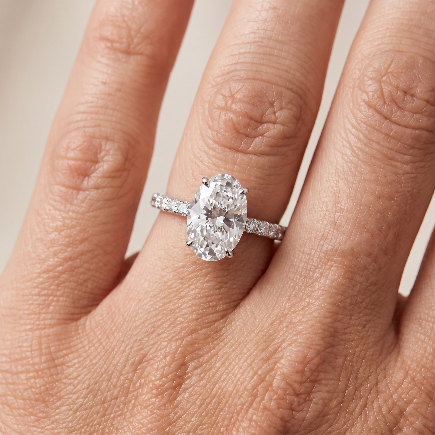 Juna French Pavé Solitaire Oval Diamond Engagement Ring in Silver - lifestyle.jpg