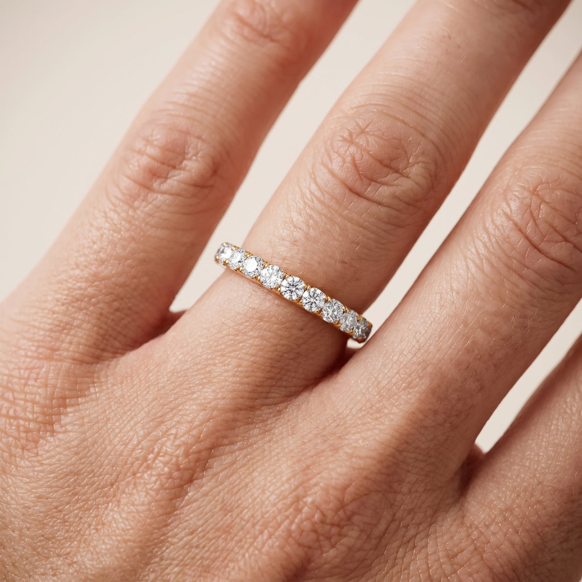 Blair French Pavé Round Diamond Eternity Band in Yellow Gold - lifestyle.jpg