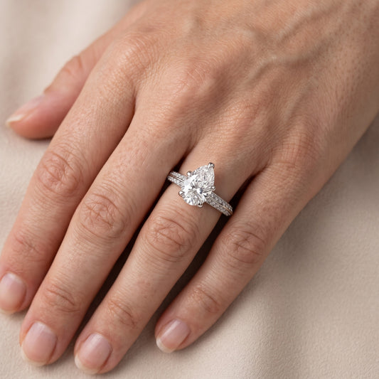 Meredith Knife Edge Pavé Pear Diamond Engagement Ring in Platinum - lifestyle.jpg